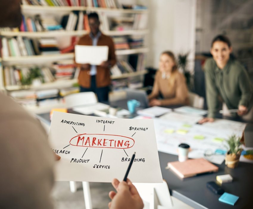 close-up-of-business-team-brainstorming-about-mark-2023-11-27-05-01-18-utc